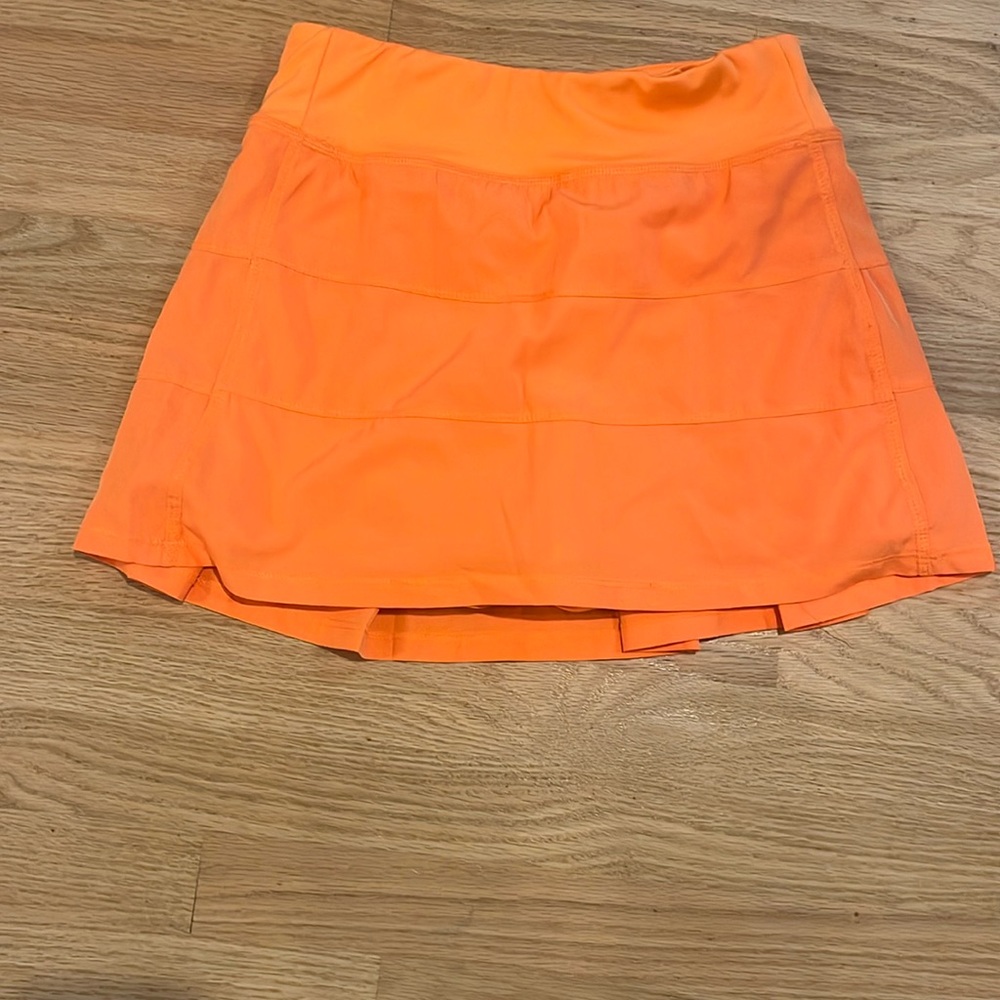 Super cute orange tennis skirt! Only worn a few times! Great for pickleball!